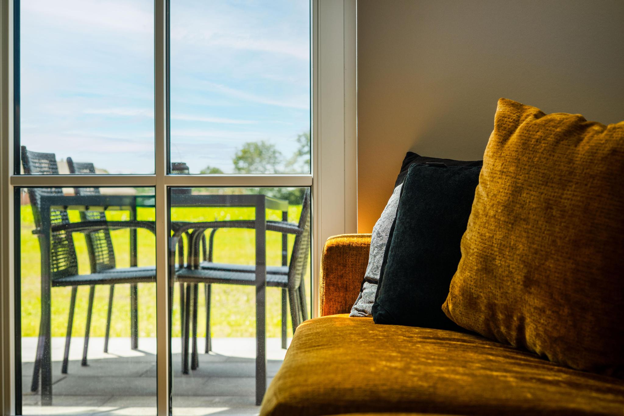 Direkter Zugang zur Terrasse vom Wohnzimmer aus
